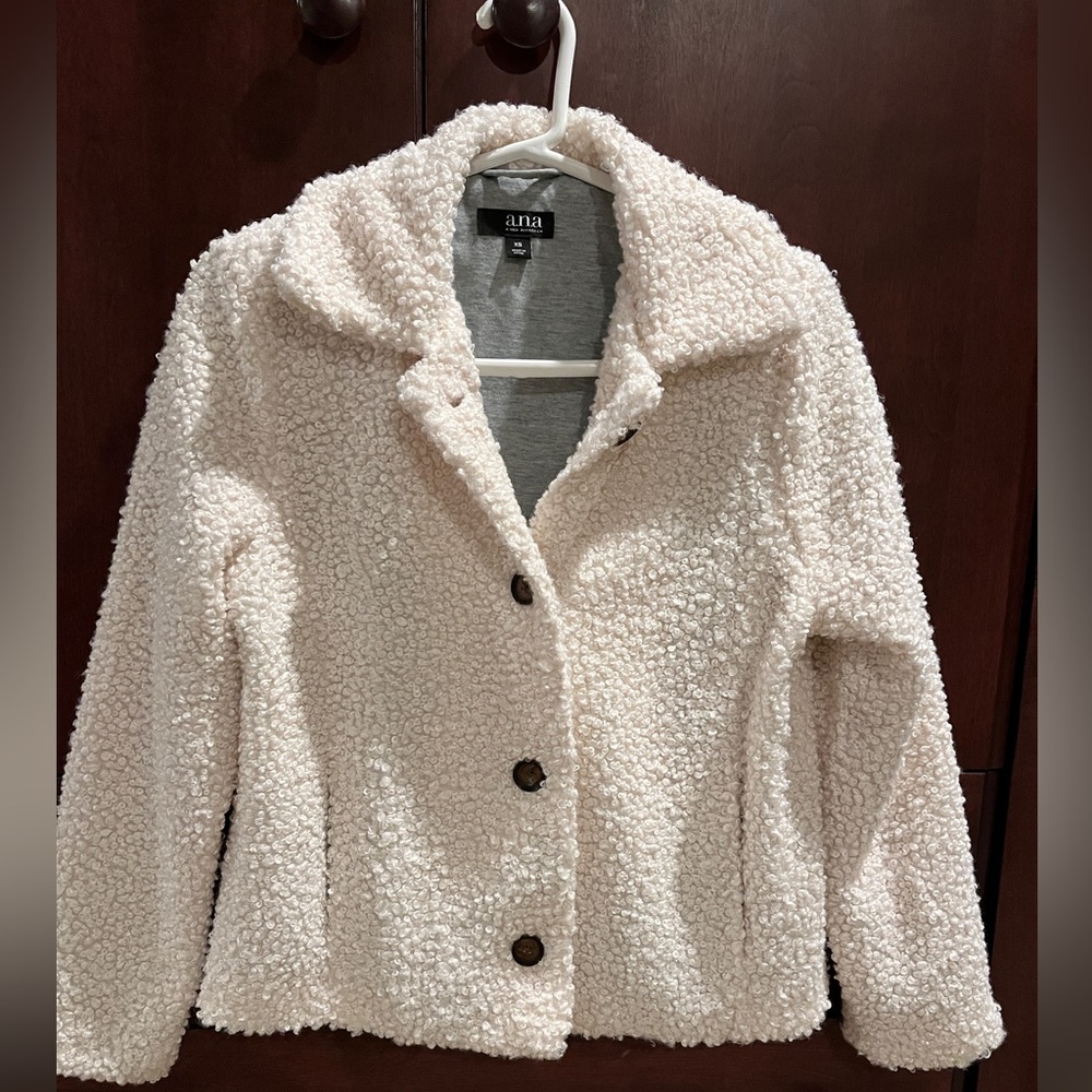 A.N.A. Cream colored, 3/4 length dress jacket. Size XS and slit style pockets.